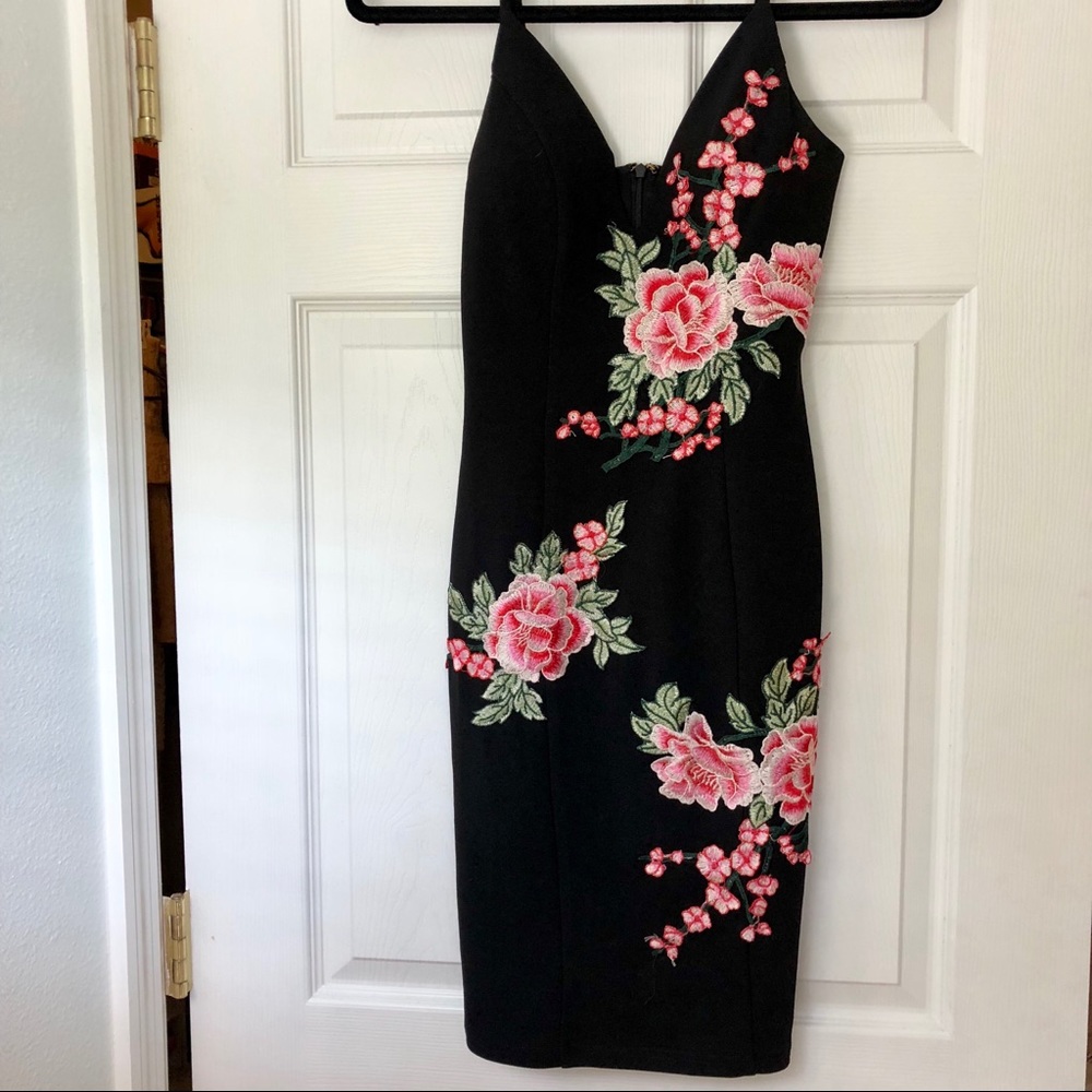 Black bodycon dress with embroidery